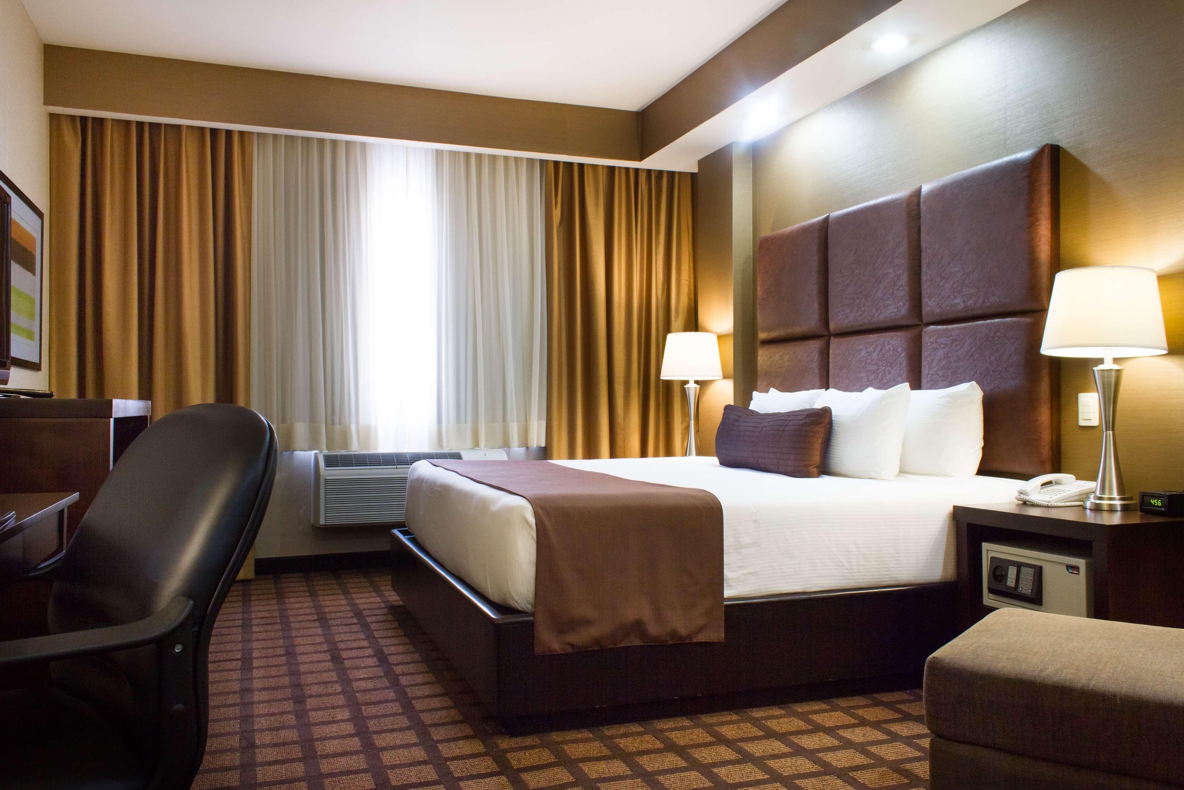 Best Western Premier Monterrey Aeropuerto Apodaca Buitenkant foto A typical room at the hotel